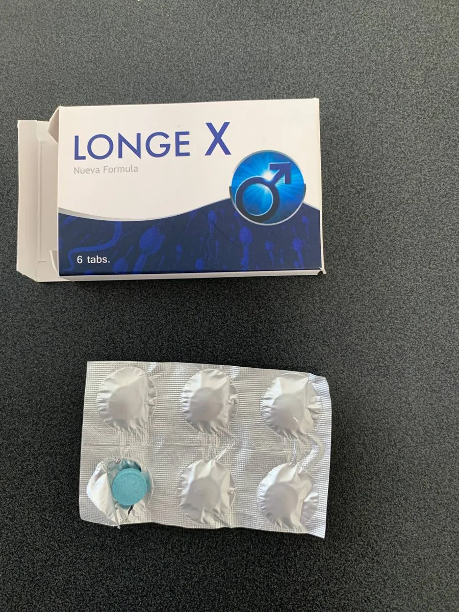 Caja de Longe X Nueva Fórmula abierta con el blíster y una tableta azul